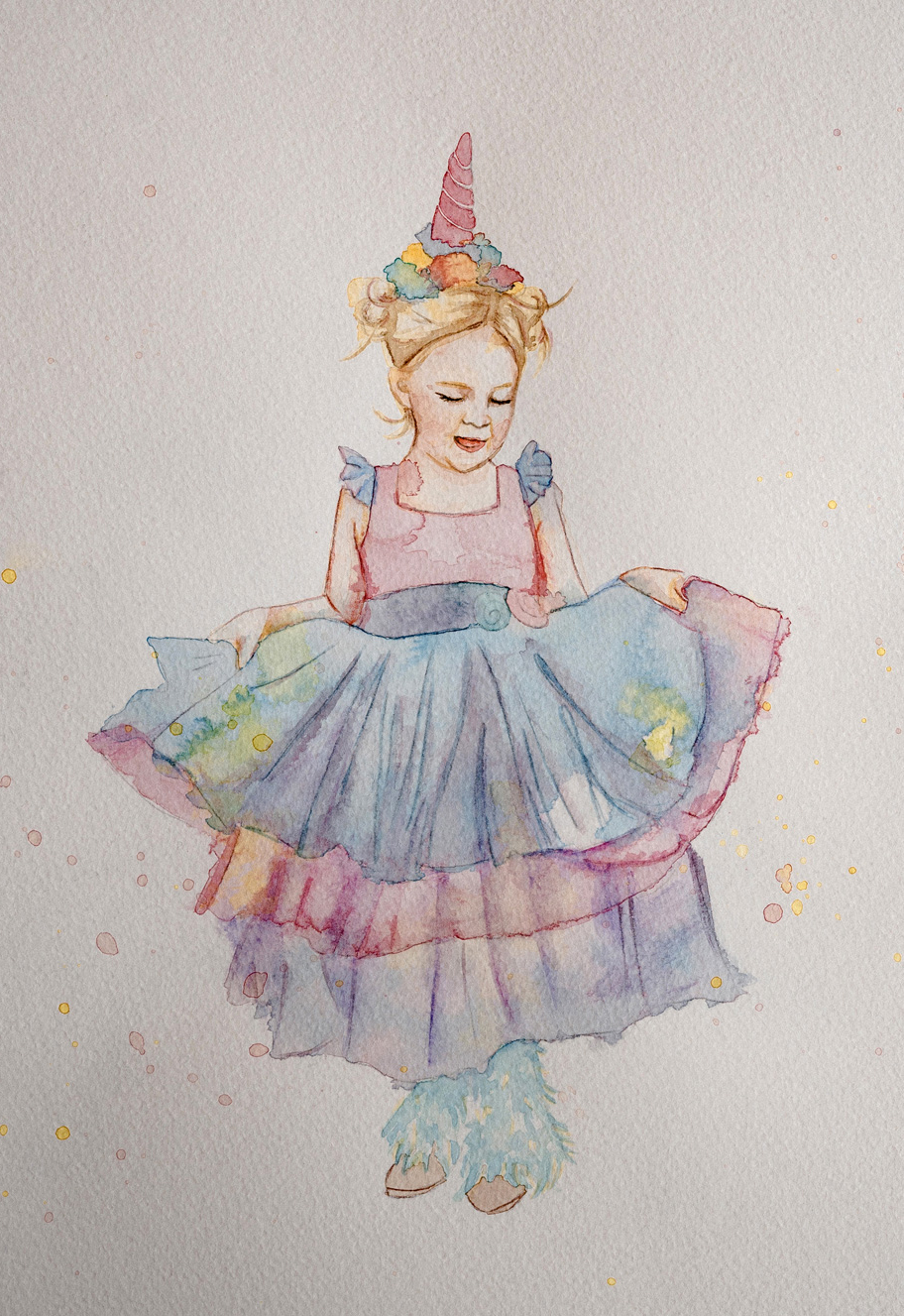 Aquarellbild eines Mädchens im Einhornkostüm