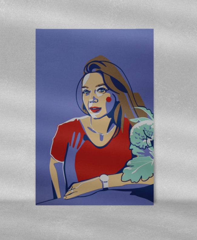 Ein Papercut Porträt einer Frau in einem Bilderrahmen.